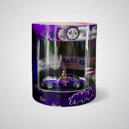 Oz Wheels Hanful Monaro Purple in Skid Cylinder 1:64 Scale Diecast Vehicle